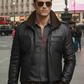 Man wearing a black leather jacket and sunglasses on a city street