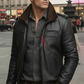Man wearing a black leather jacket and sunglasses in an urban setting
