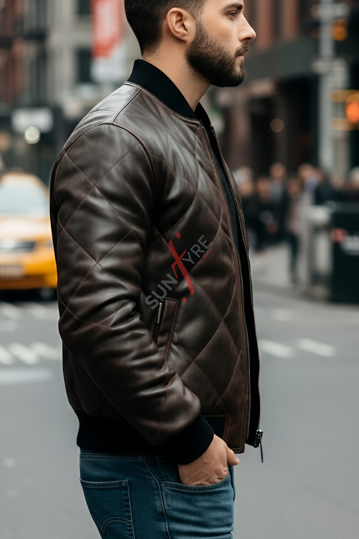 Man wearing a brown leather jacket with 'Suntory' branding on a city street.